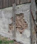 Crumbling barn wall